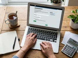 Person registering for HMRC Self Assessment online for the first time on a laptop