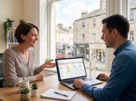 Small UK business team using AI sales software on a laptop to manage their sales pipeline